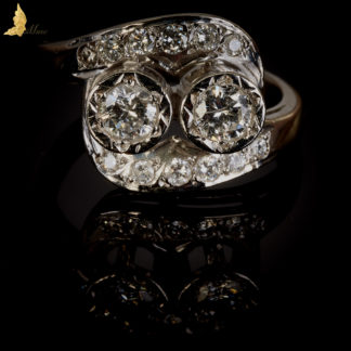 Futurystyczny pierścionek z brylnatami 'podwójnie zaręczynowy' w białym złocie 14K