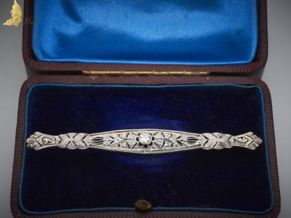 Podłużna brosza Art Deco z brylantem w starym szlifie ok. 0,15 ct