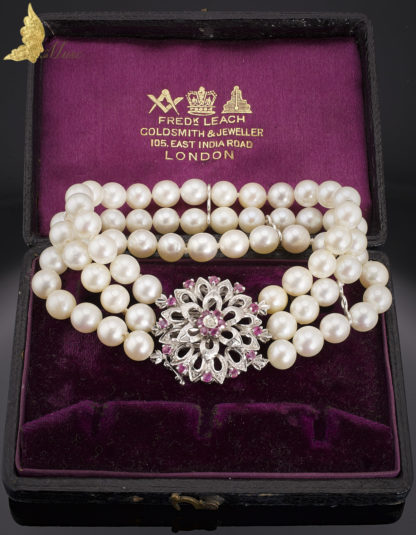 Trzyrzędowa bransoleta z perłami i rubinami w białym złocie pr. 750
