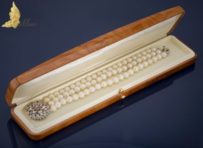 Trzyrzędowa bransoleta z perłami i rubinami w białym złocie pr. 750