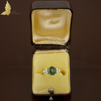 Pierścionek z zielonym turmalinem 1,80 ct i brylantami ok. 0,30 ct w żółtym złocie