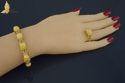 Bransoleta Reverie w żółtym złocie 18K, z szafirami i bursztynem Royal Amber