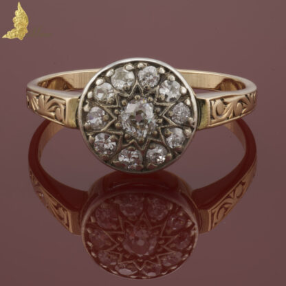 Antyczny pierścionek 'koło' z brylantami ok. 0,50 ct w srebrze i żółtym złocie pr. 585