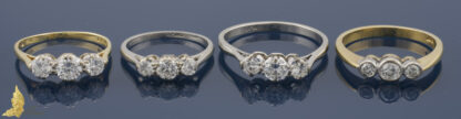 Antyczne pierścionki z trzema brylantami w platynie i w złocie 18K